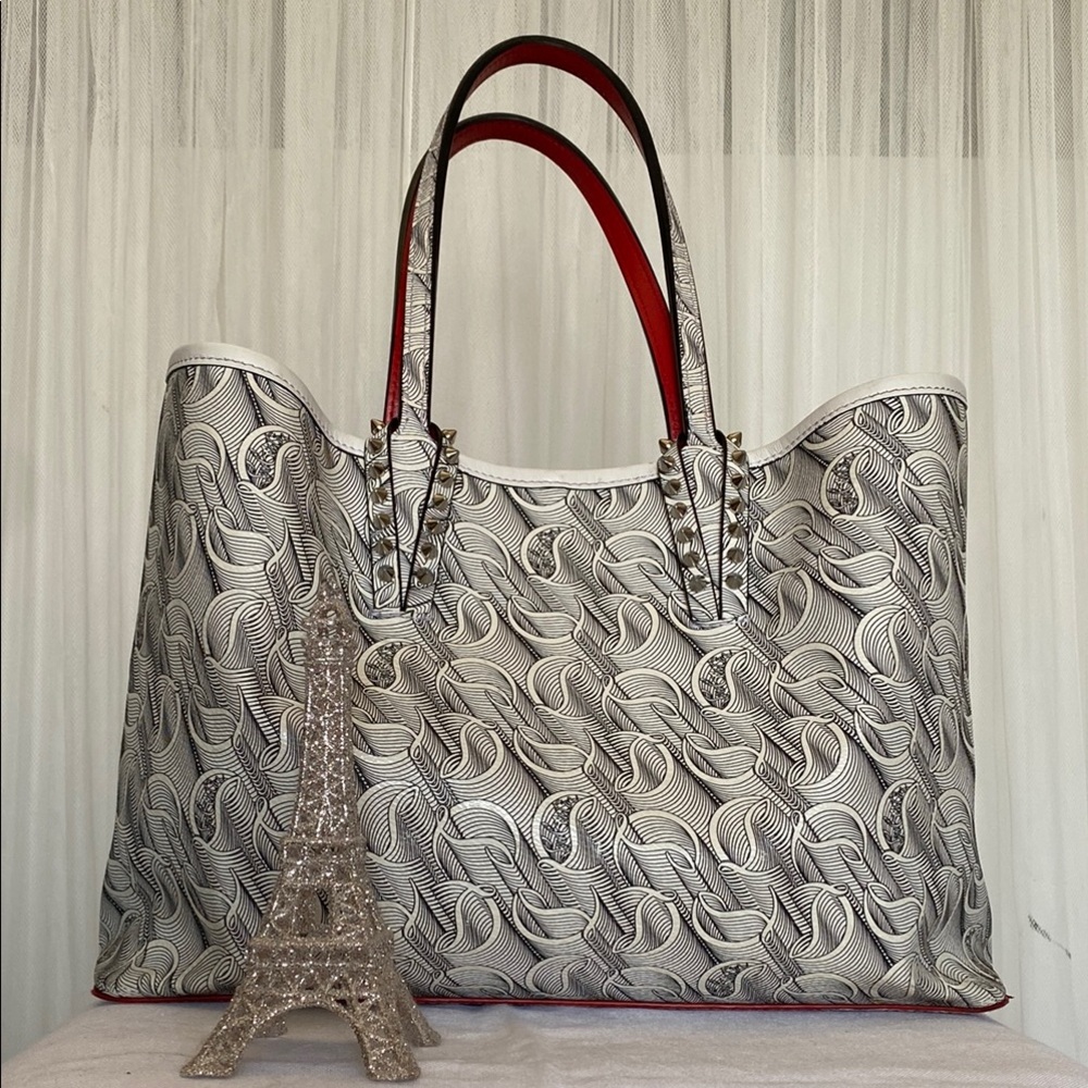 Elegant Black and White Patterned Louboutin Caba Bag with Pouch